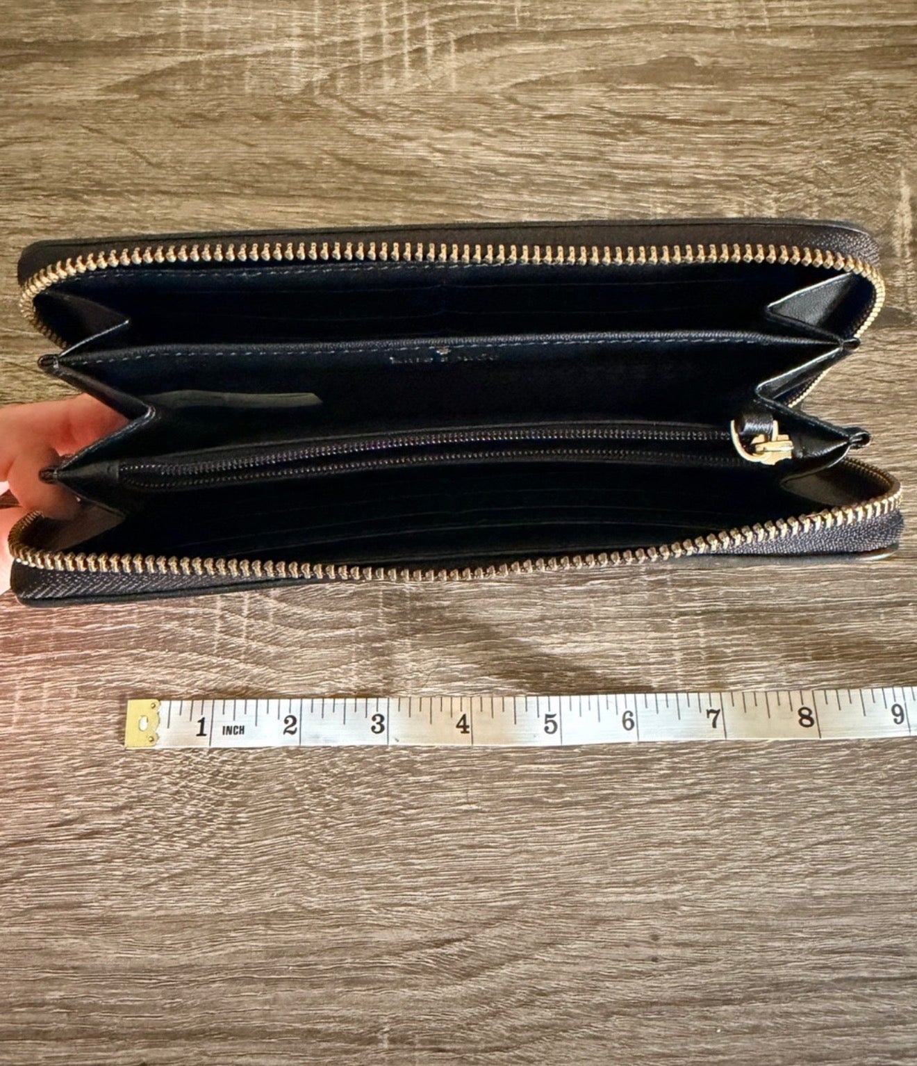 Kate Spade Pebbled Black Leather Zip-Around Wallet with Gold Plaque