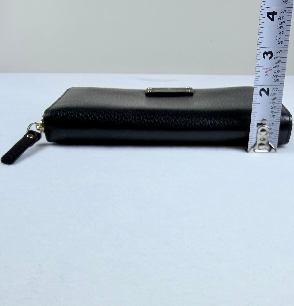 Kate Spade Pebbled Black Leather Zip-Around Wallet with Gold Plaque