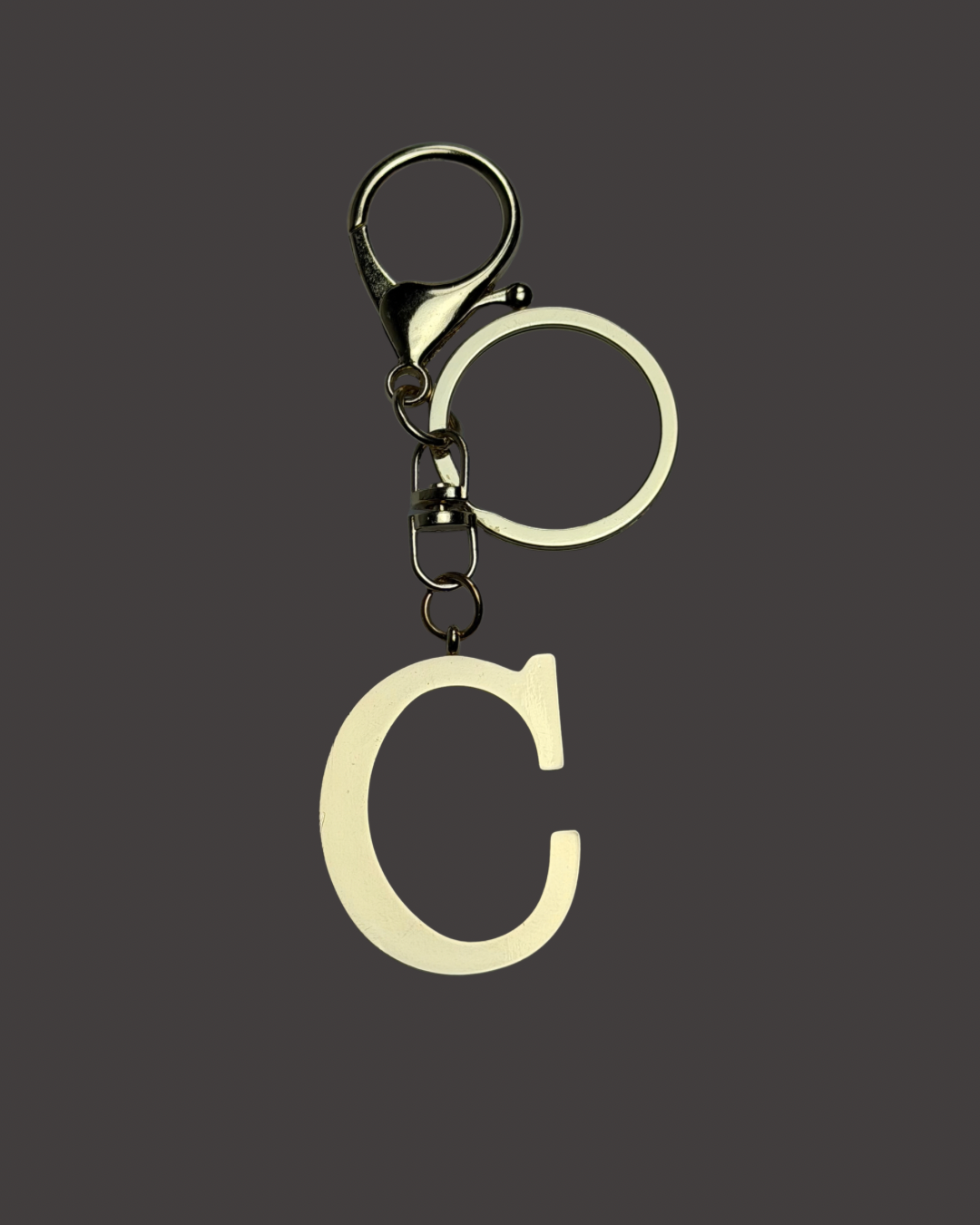 Gold Colored Letter Bag Charm