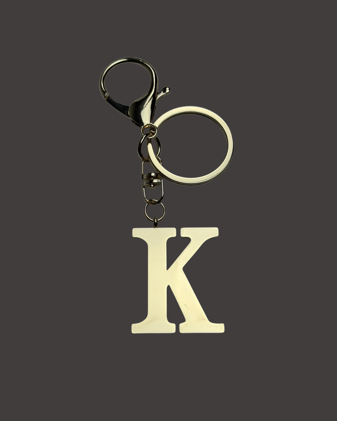 Gold Colored Letter Bag Charm