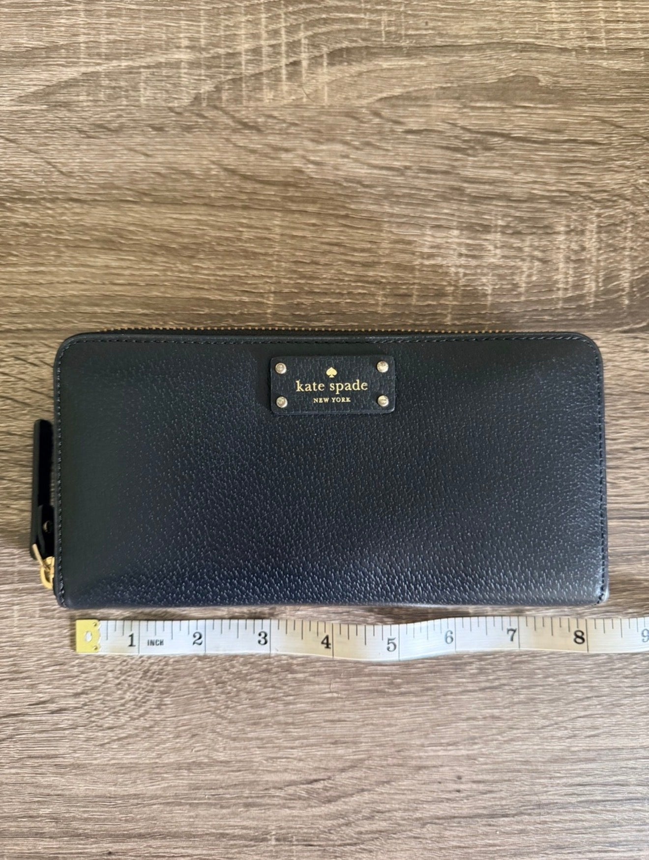 Kate Spade Pebbled Black Leather Zip-Around Wallet with Gold Plaque