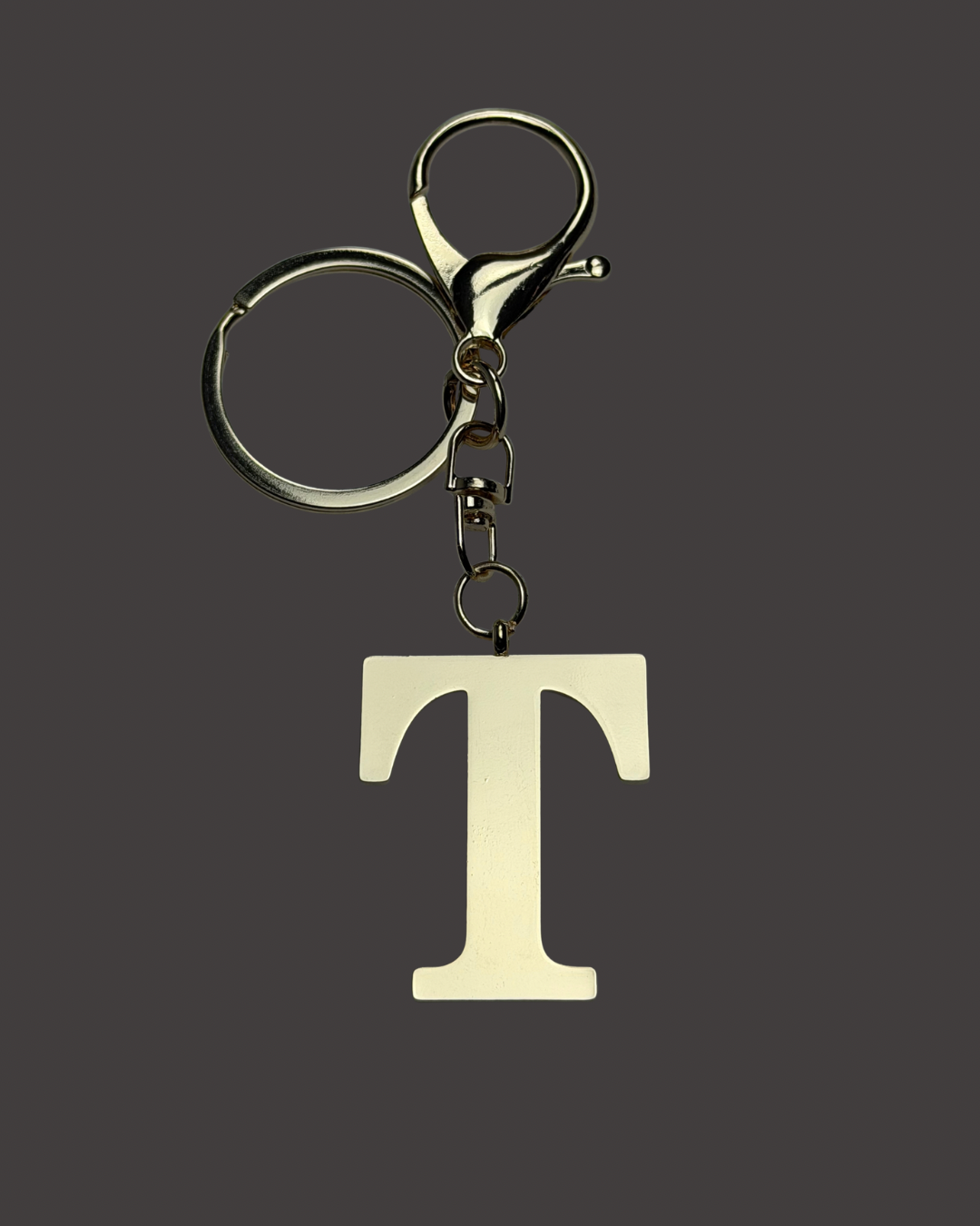 Gold Colored Letter Bag Charm