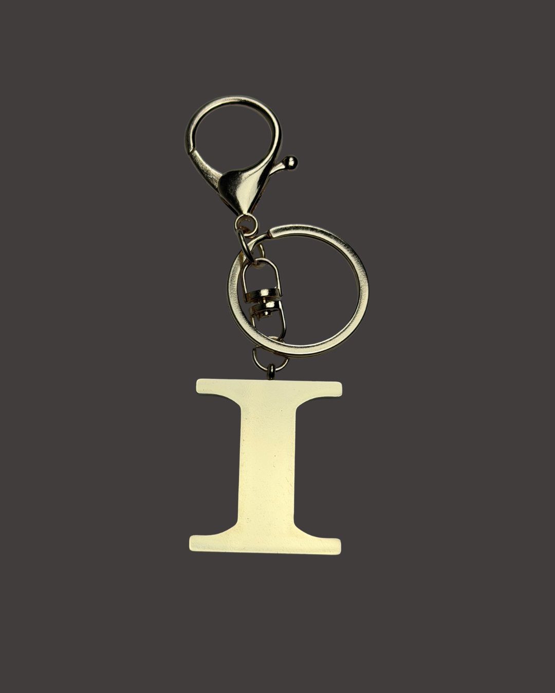 Gold Colored Letter Bag Charm