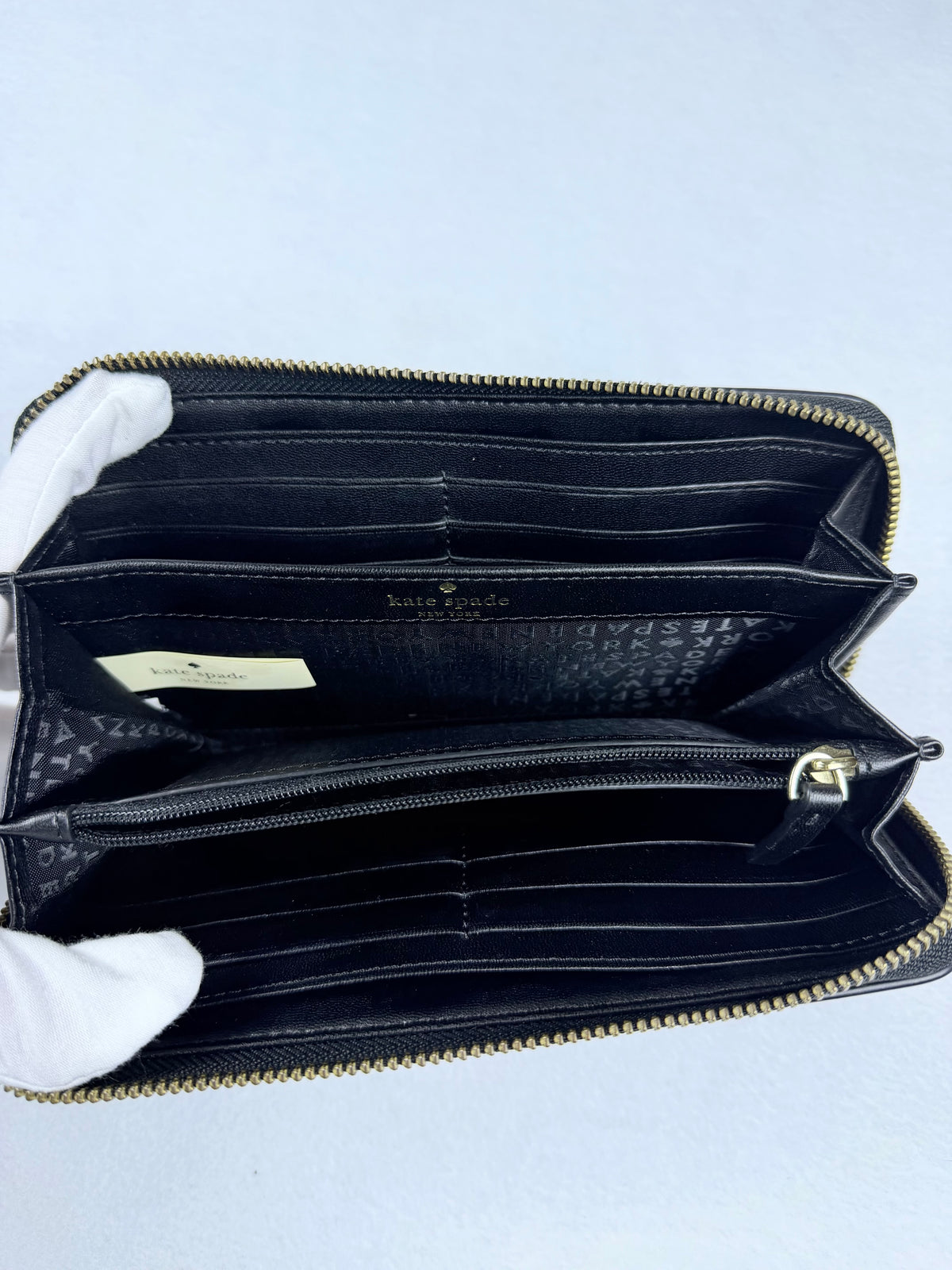 Kate Spade Pebbled Black Leather Zip-Around Wallet with Gold Plaque