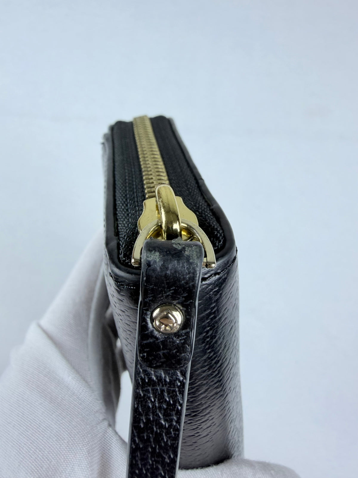Kate Spade Pebbled Black Leather Zip-Around Wallet with Gold Plaque