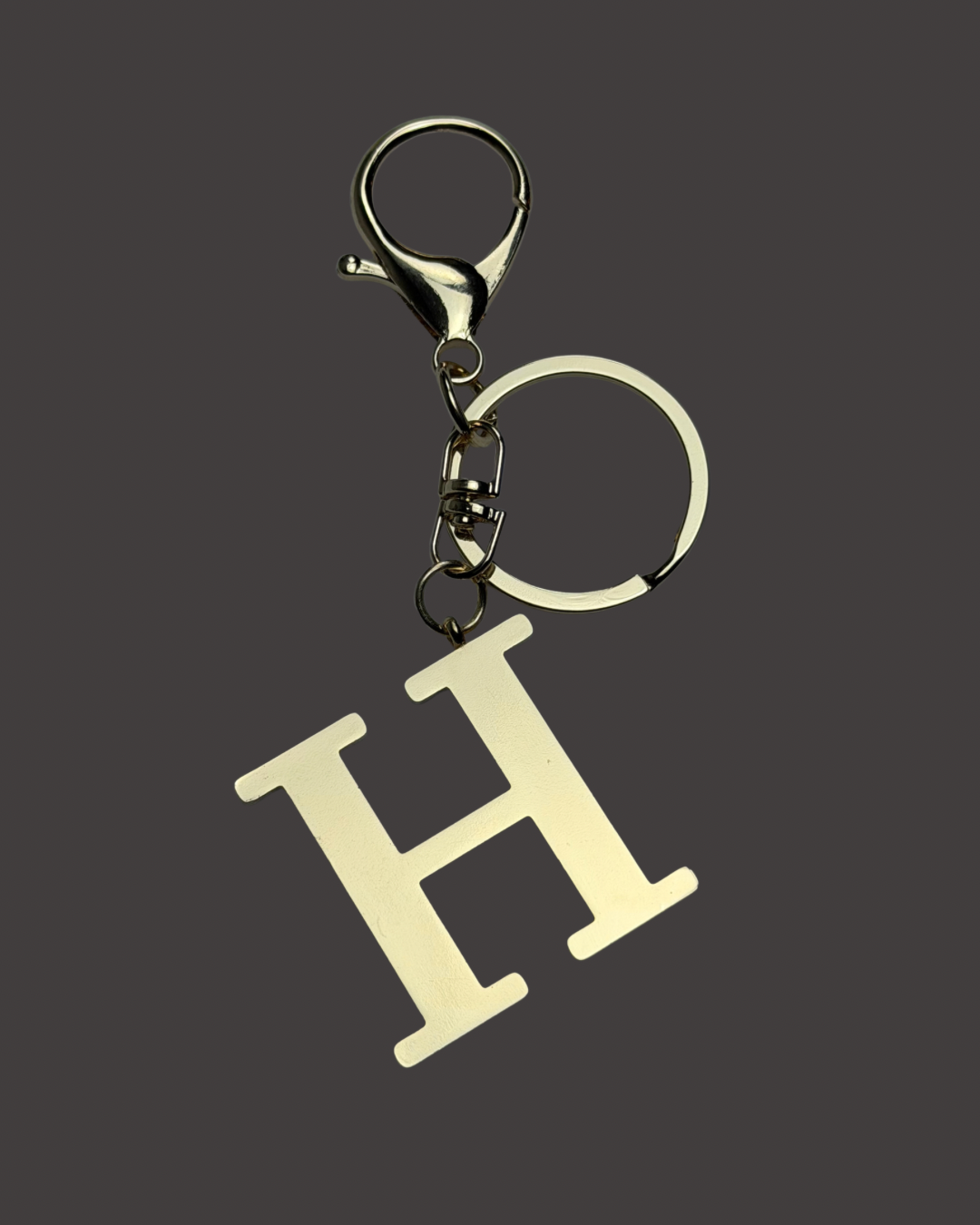 Gold Colored Letter Bag Charm