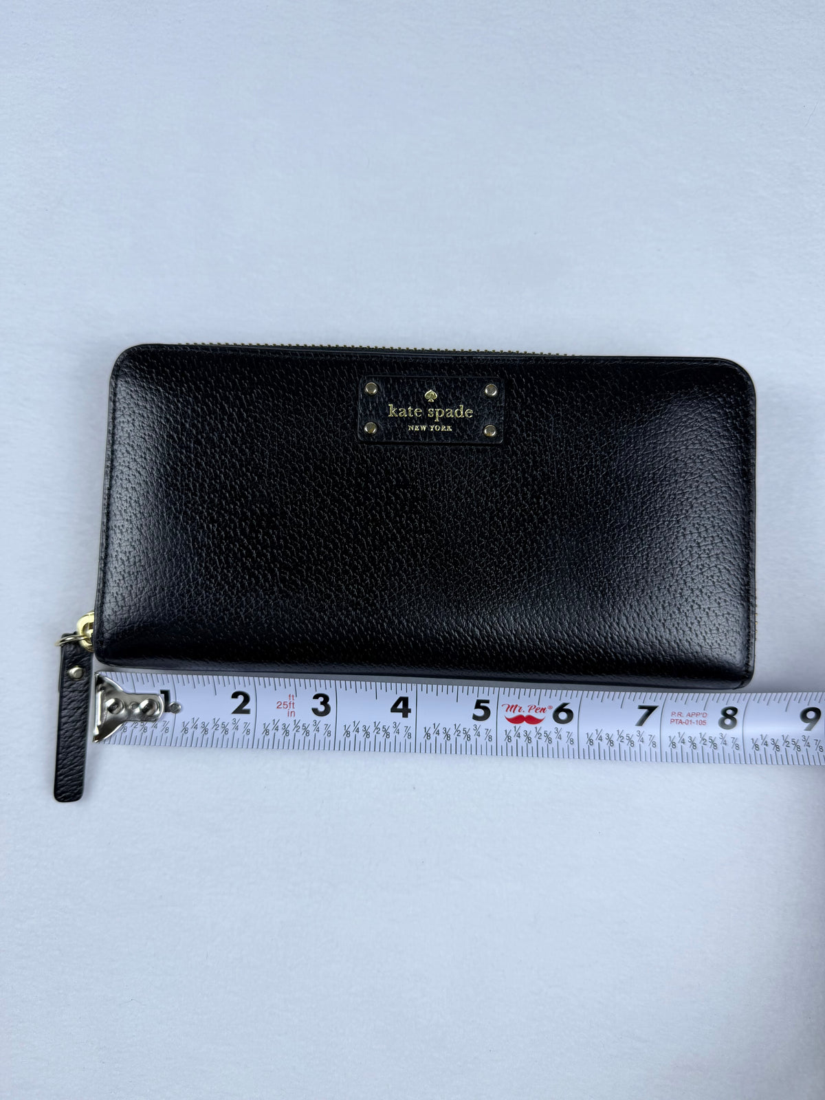 Kate Spade Pebbled Black Leather Zip-Around Wallet with Gold Plaque
