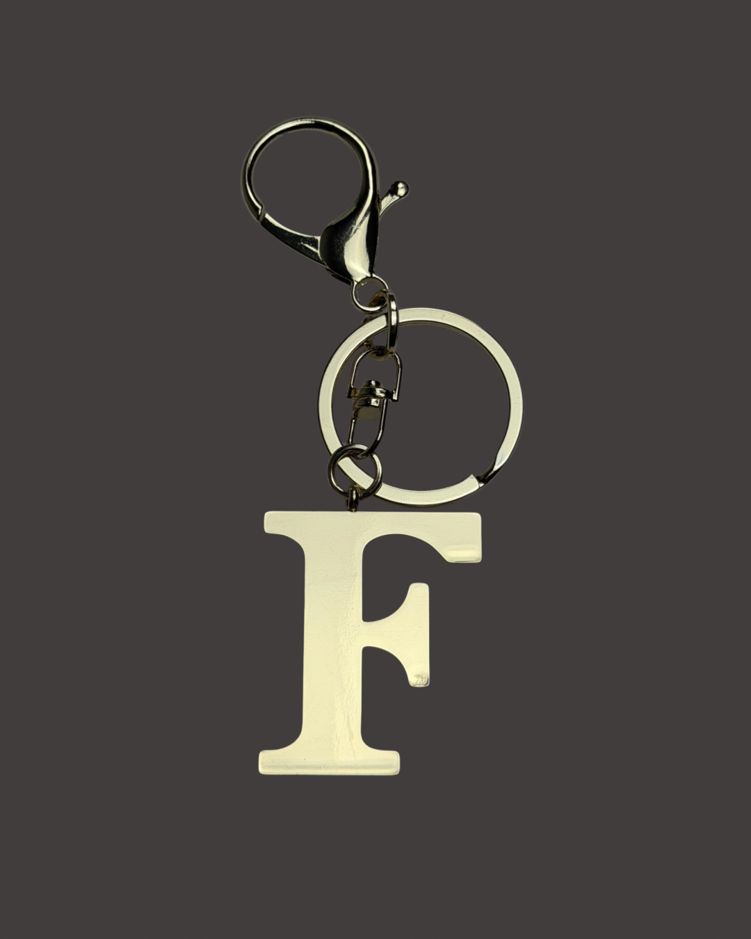 Gold Colored Letter Bag Charm