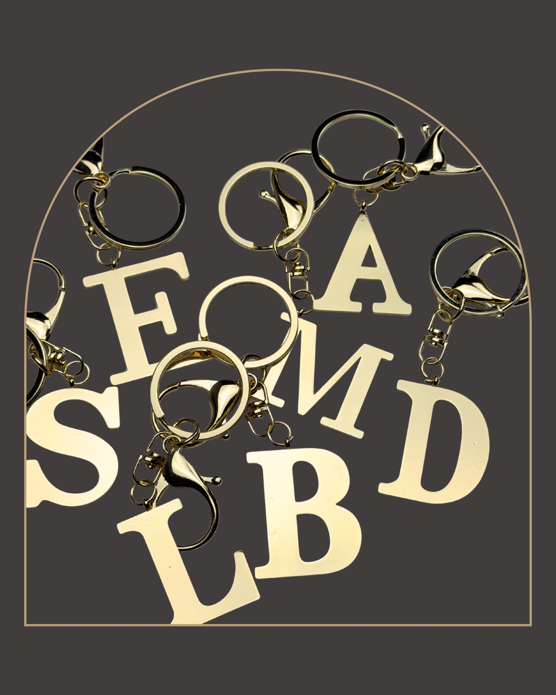 Gold Colored Letter Bag Charm